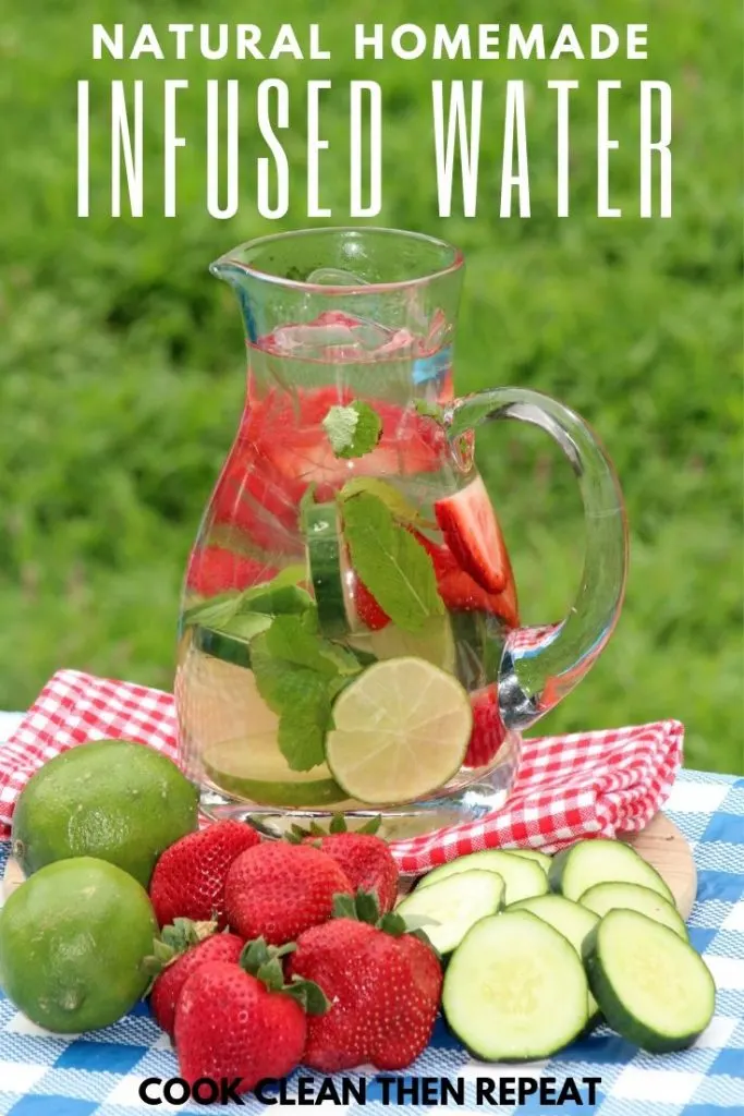 Natural homemade infused water in white text at the top of an image of a pitcher of water with fruit and herbs inside.