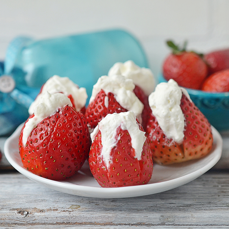featured image showing finished cheesecake stuffed strawberries.