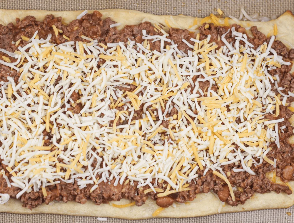 topped with cheese before baking taco bake 