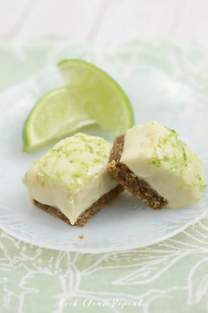 Fudge on a tray with the limes in the background.