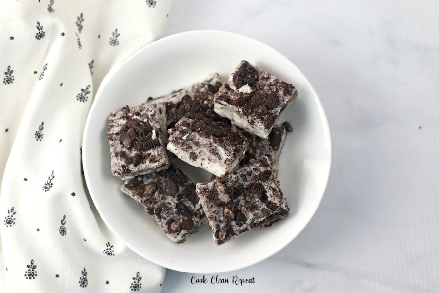 A dish full of cookies and cream fudge ready to be shared.