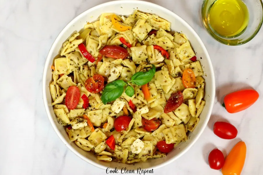 A large bowl full of the delicious pasta salad with veggies ready to eat. 