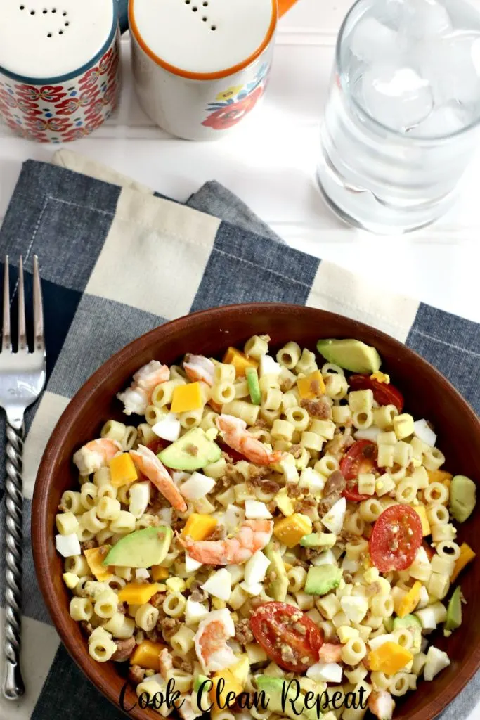 A top down view of the finished pasta salad with shrimp in a bowl ready to eat.