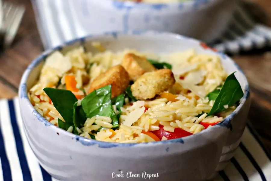 Featured Image showing the finished orzo pasta salad recipe in a bowl ready to eat.