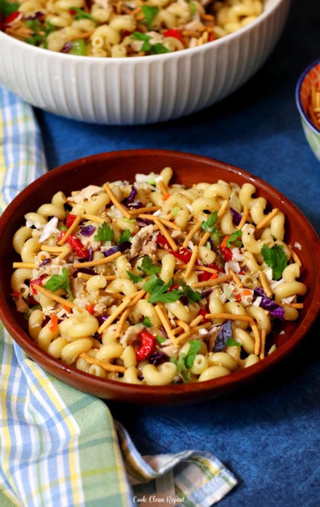 A close up view of the finished pasta salad with chicken ready to be shared and enjoyed. 