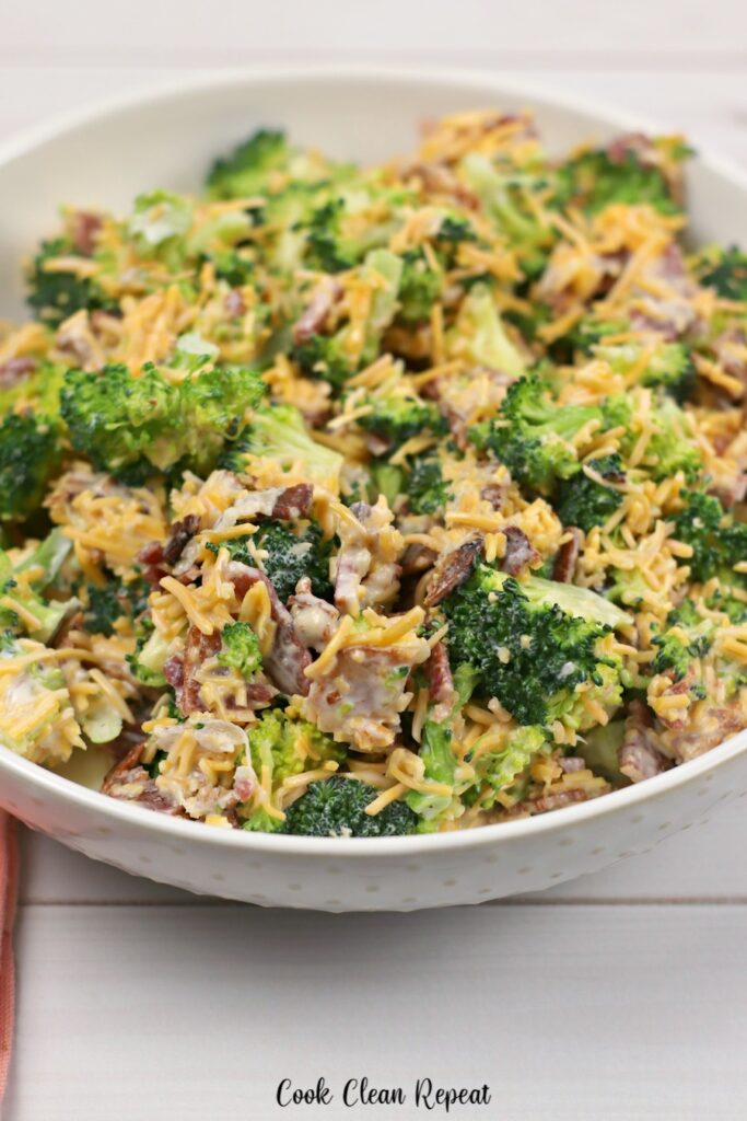 A bowl full of ruby Tuesday broccoli salad finished and ready to be enjoyed. 