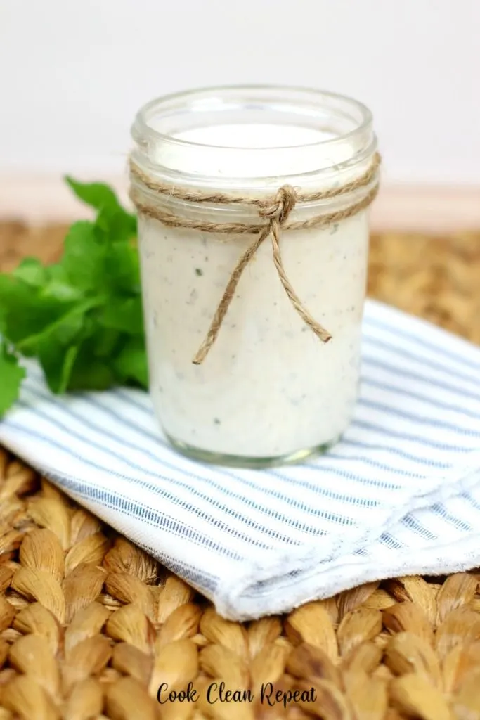 here's a look at the finished ruby Tuesday ranch dressing recipe in a mason jar ready to be served. 