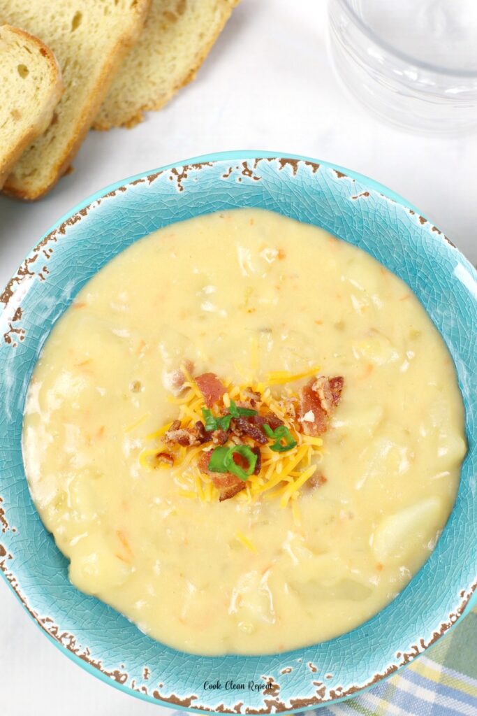 A top down look at the bowl full of the Ruby Tuesday potato soup recipe.
