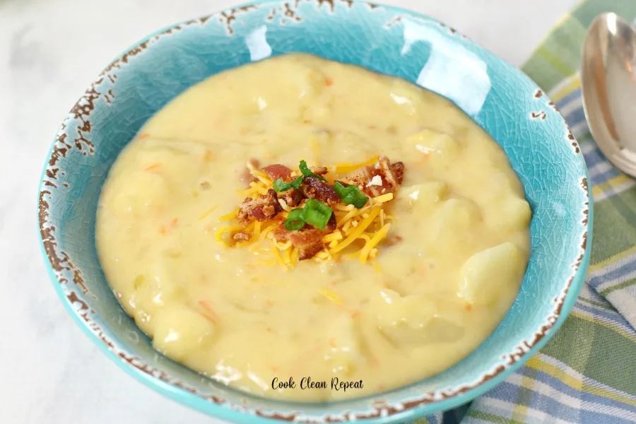 Featured image showing the finished ruby Tuesday potato cheese soup recipe in a bowl ready to be eaten.