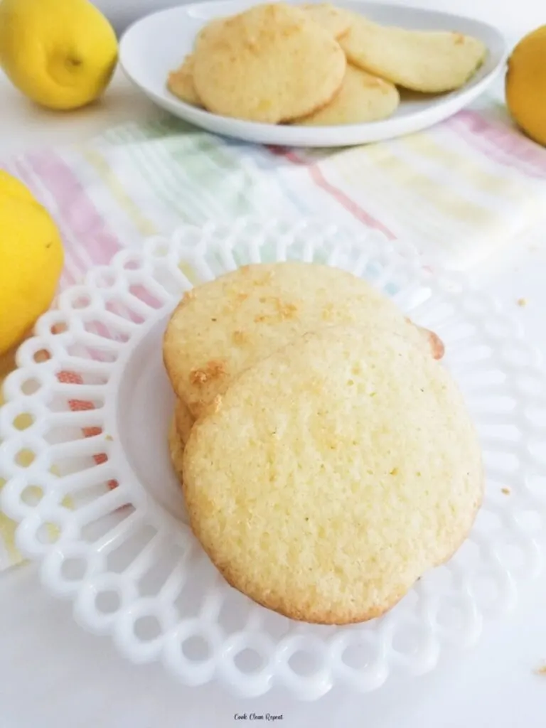 Top down view of a stack of ready to eat lemon cake mix cookies. 