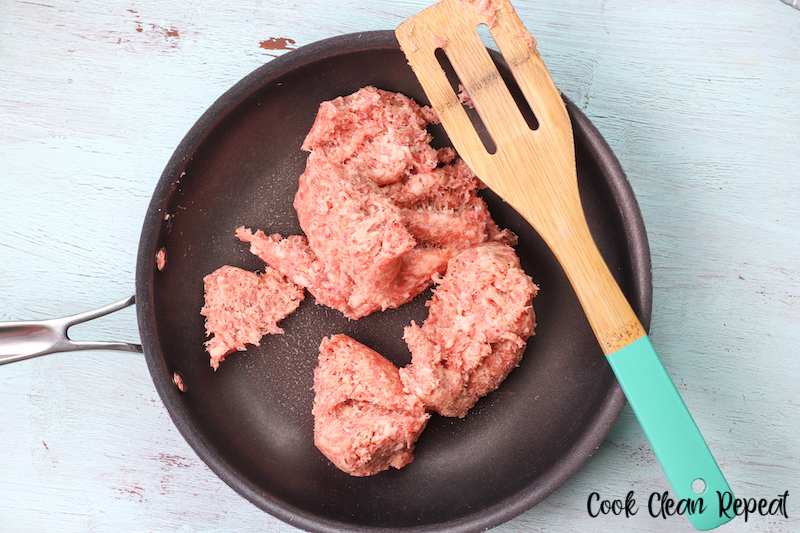 raw meat in skillet