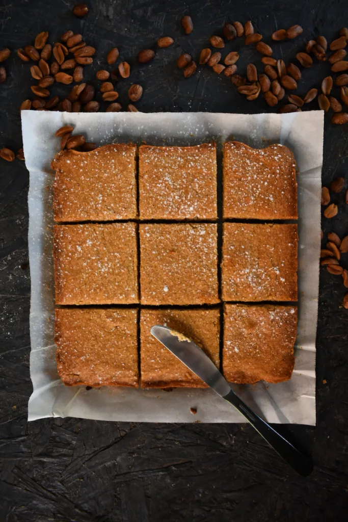 Featured image showing the finished and cut pan of peanut butter blondies.