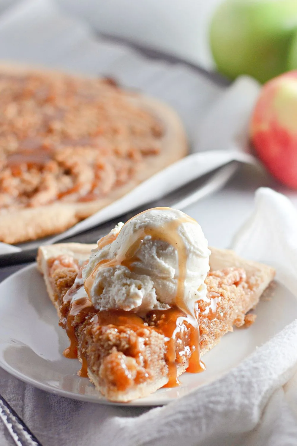 up close image of apple pizza with ice cream on top