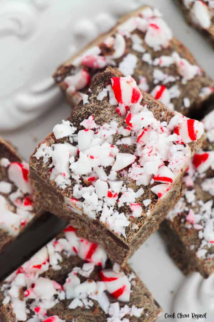 A top down shot of a piece of the finished chocolate candy cane fudge. 