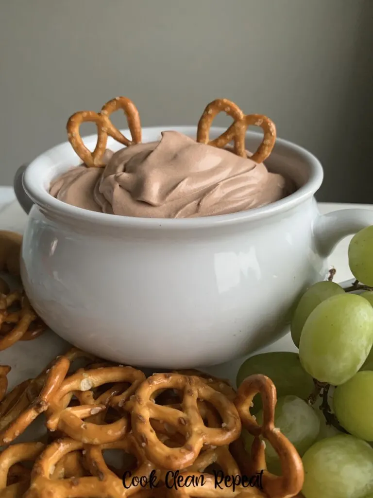 here we see the finished chocolate pudding dip with pretzels on top. 
