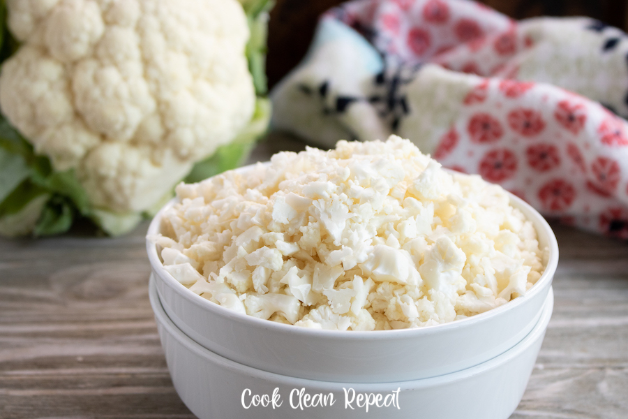Featured image showing the finished product of how to make cauliflower rice ready to cook or store.