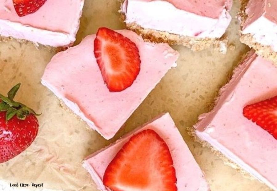 A top down look at the finished strawberry cheesecake bars ready to eat.