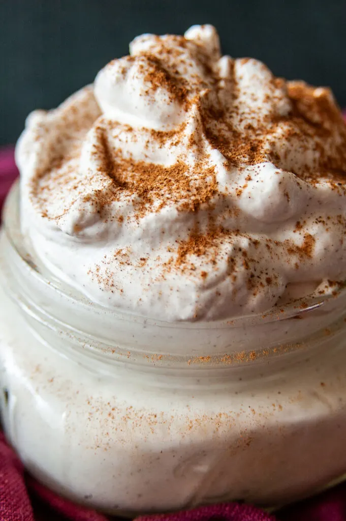 A close up side view of the finished whipped cream topping. 