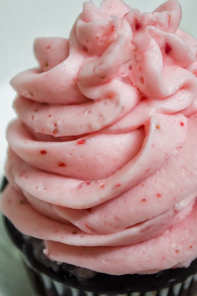 A very close up look at the finished strawberry icing ready to eat. 