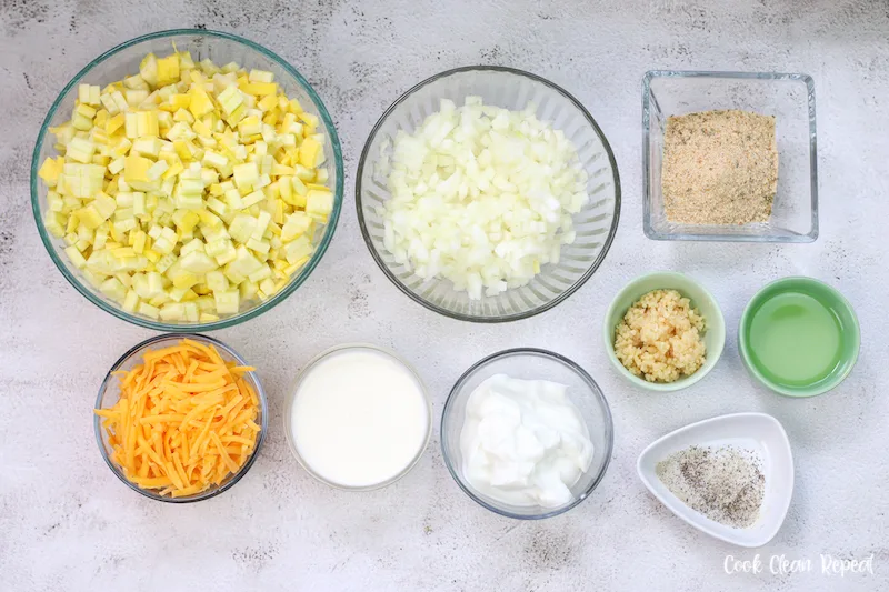 ingredients needed to make squash and zucchini casserole ready to eat.