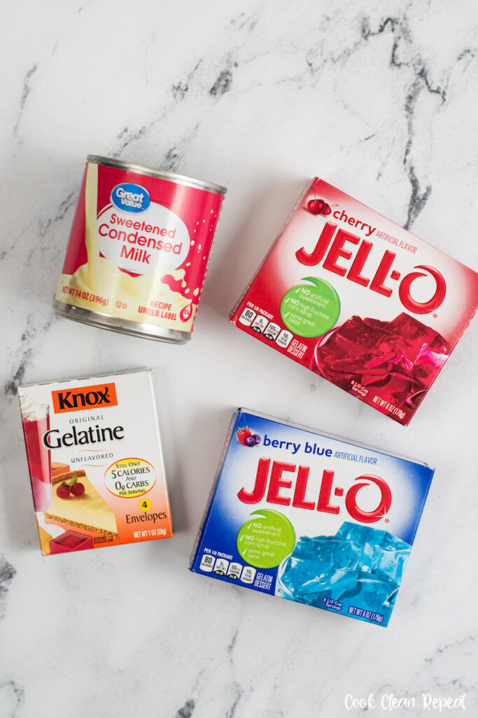 Ingredients needed to make red white and blue jello ribbon squares. 