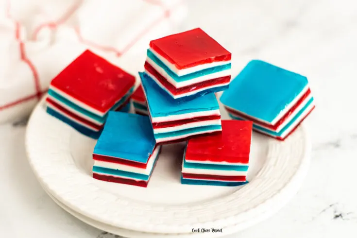 Featured image showing the finished red white and blue jello ribbon salad ready to eat.