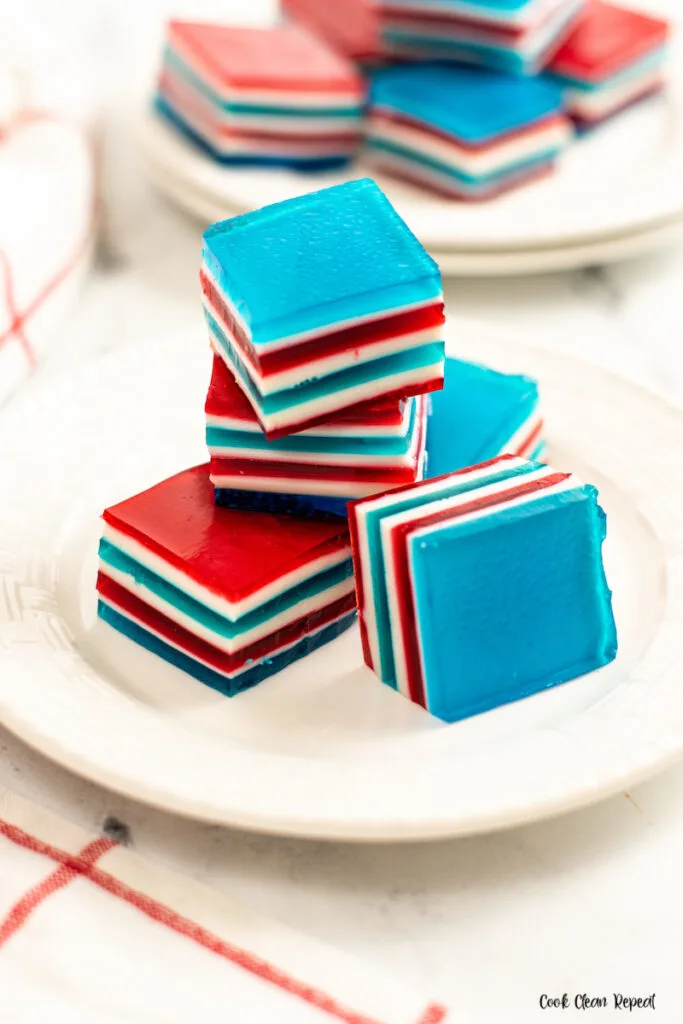 A stack of the finished red white and blue jello ribbon salad ready to eat. 