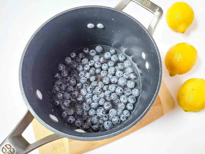 blueberries in a pot.
