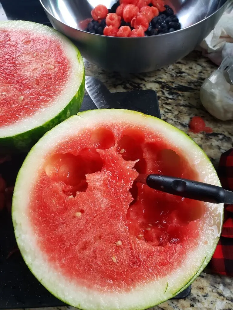 Watermelon sliced in half ready to be balled. 