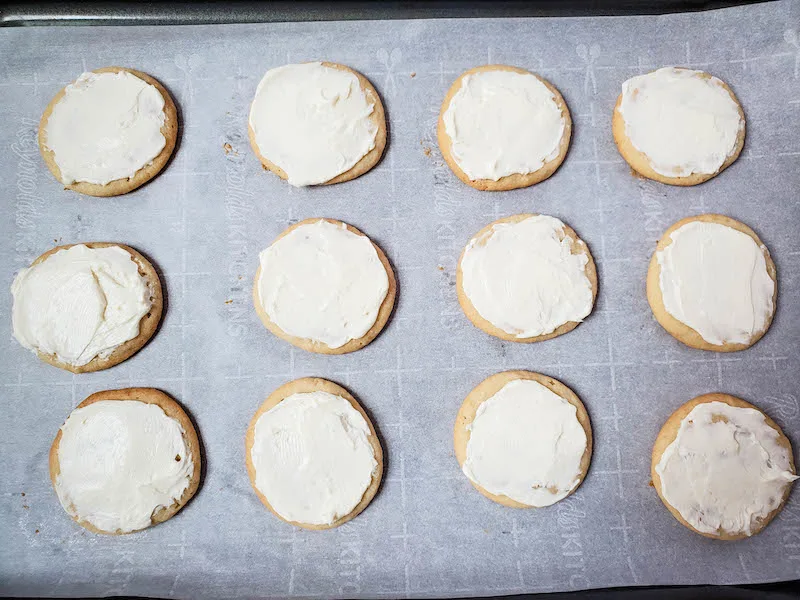 Iced cookies ready for pizza toppings. 
