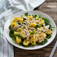 Featured image showing a bowl full of the finished lemon chicken tortellini salad ready to eat.