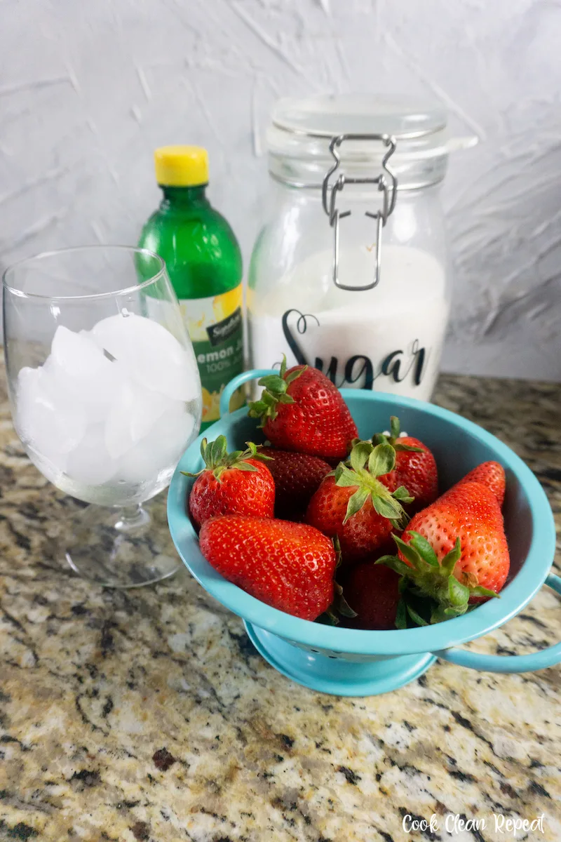 Another look at the ingredients needed to make strawberry lemonade that is fresh and homemade. 