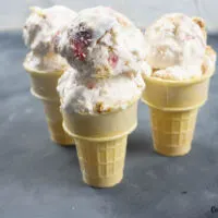 Featured image showing the finished strawberry cheesecake ice cream recipe ready to eat.