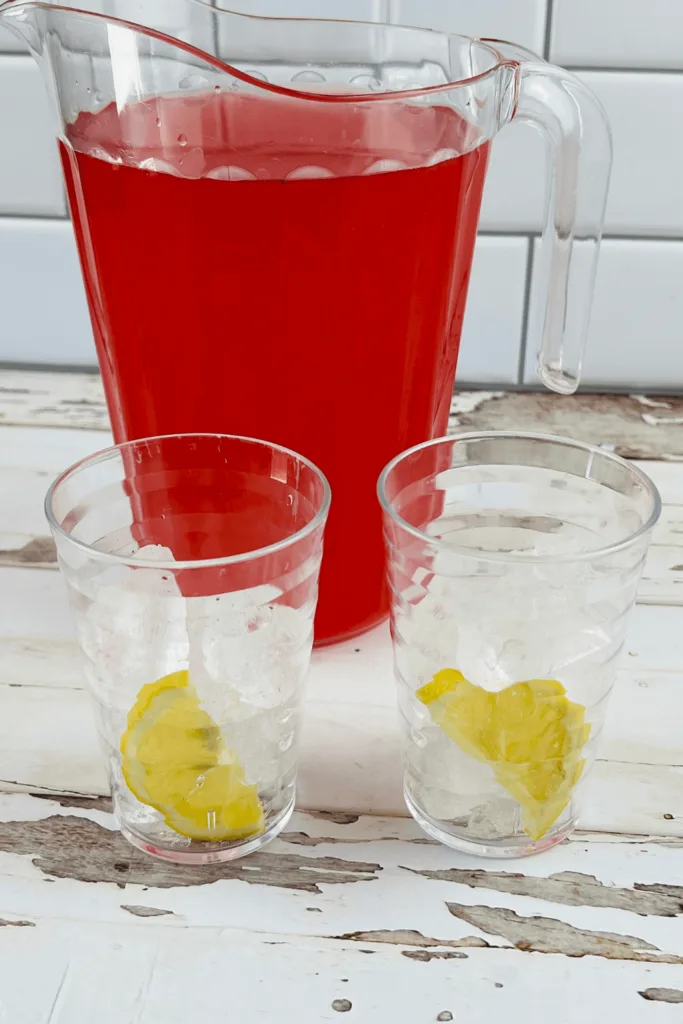 glasses with slices of lemon for homemade pink lemonade