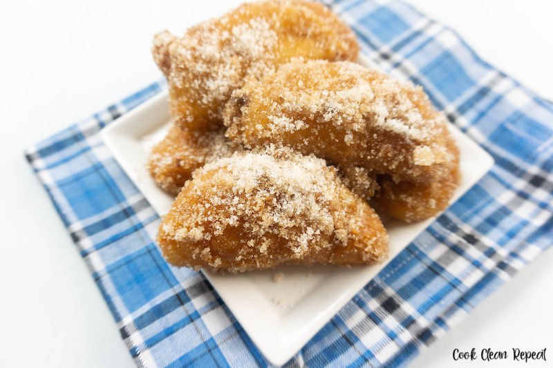 Fried apples recipe ready to eat with cinnamon sugar coating. 