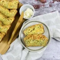 featured image showing the finished slices of zucchini bread with cheese.