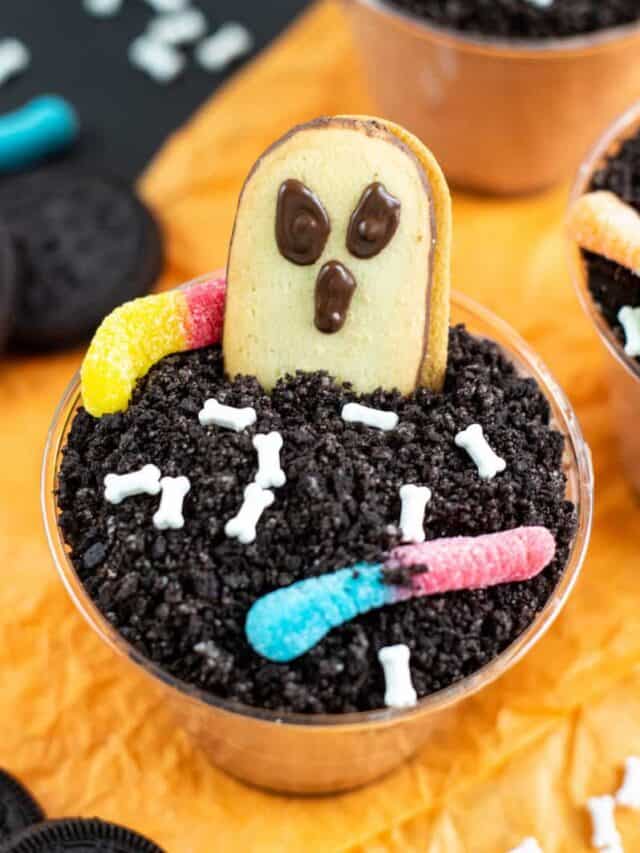 A finished look at the halloween dirt pudding dessert cups ready to eat.
