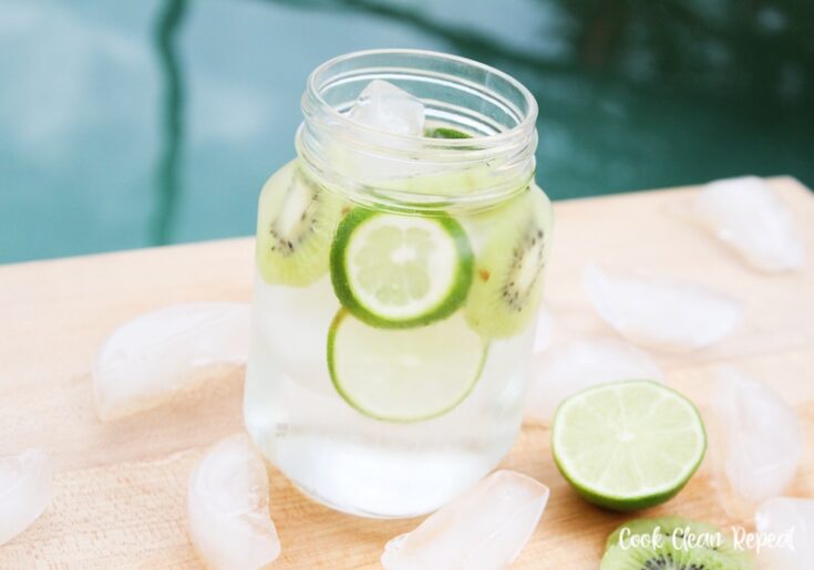 Featured image showing a glass of the finished kiwi lime water recipe ready to drink.