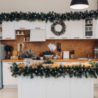 decorative image white kitchen with pine holiday decor
