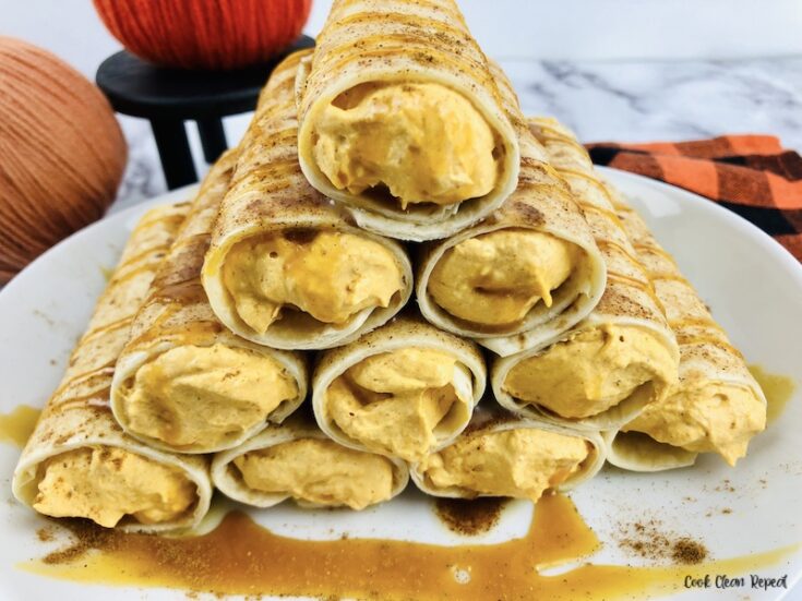 Featured image showing the finished no bake pumpkin cream cheese dessert roll ups ready to eat