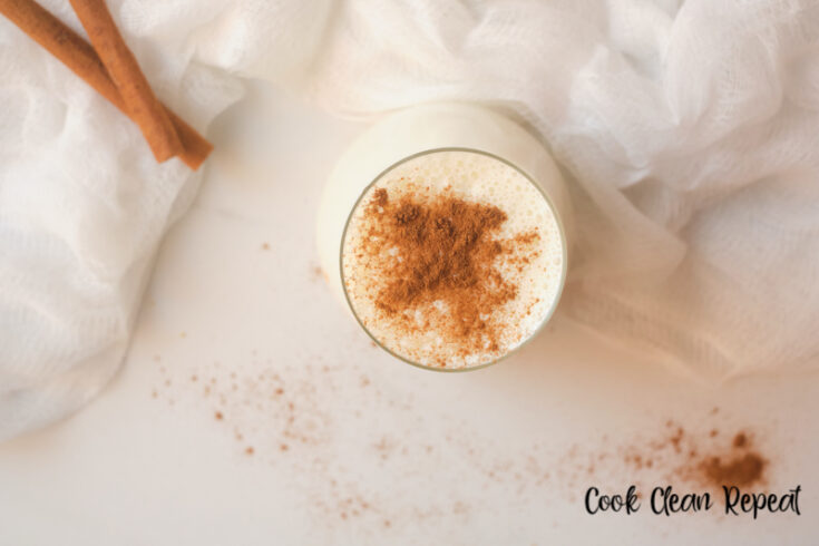 featured image showing finished cup of easy egg nog recipe ready to drink.