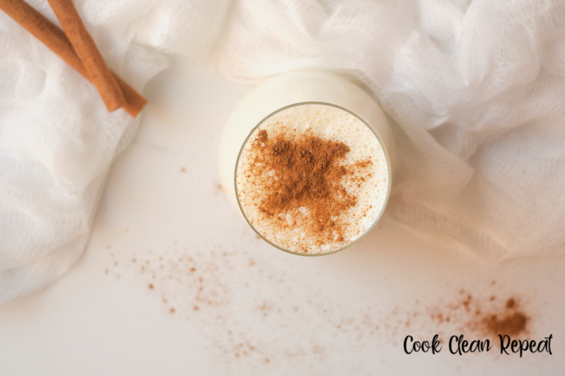 featured image showing finished cup of easy egg nog recipe ready to drink.