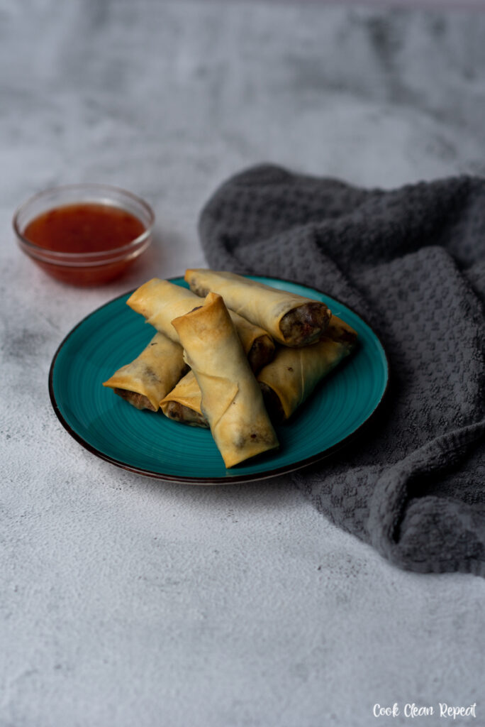 plate filled with finished homemade air fryer egg rolls