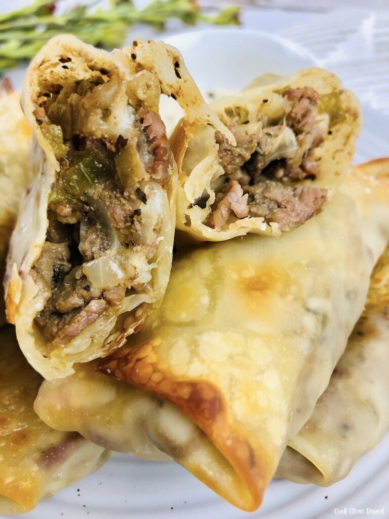 close up of cut open Philly cheesesteak egg rolls recipe