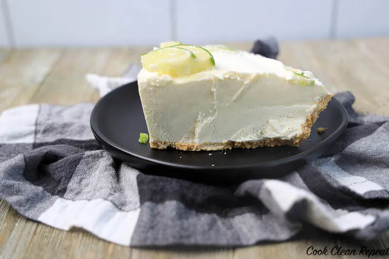 side view of a slice of finished key lime ice cream pie