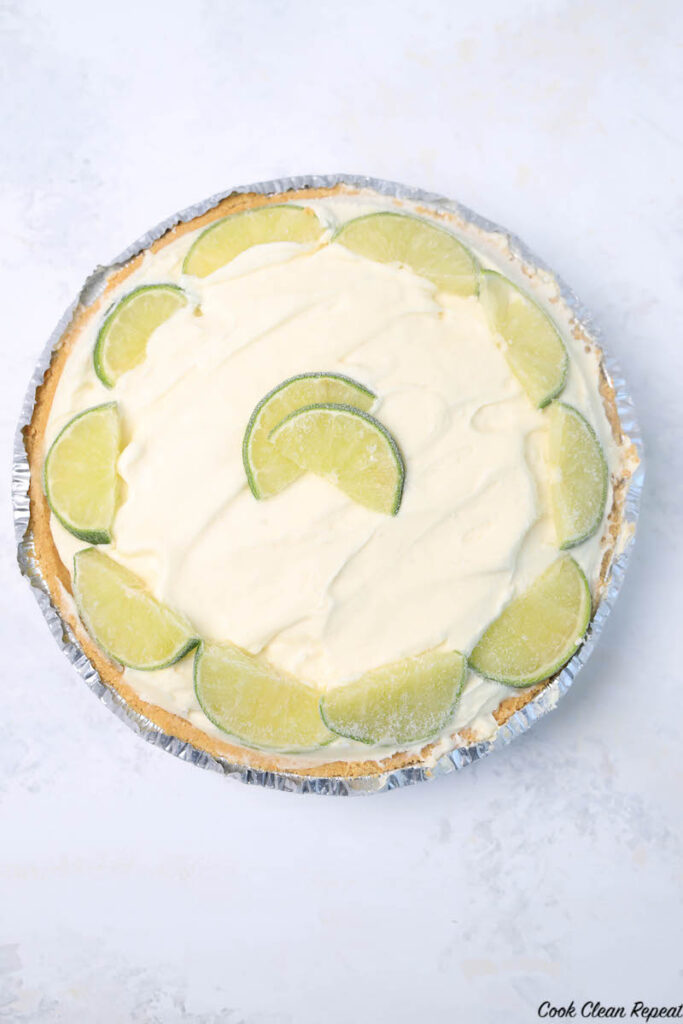 pie topped with sliced limes