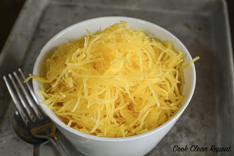 A look into a bowl of the finished product after you learn how to bake spaghetti squash. 