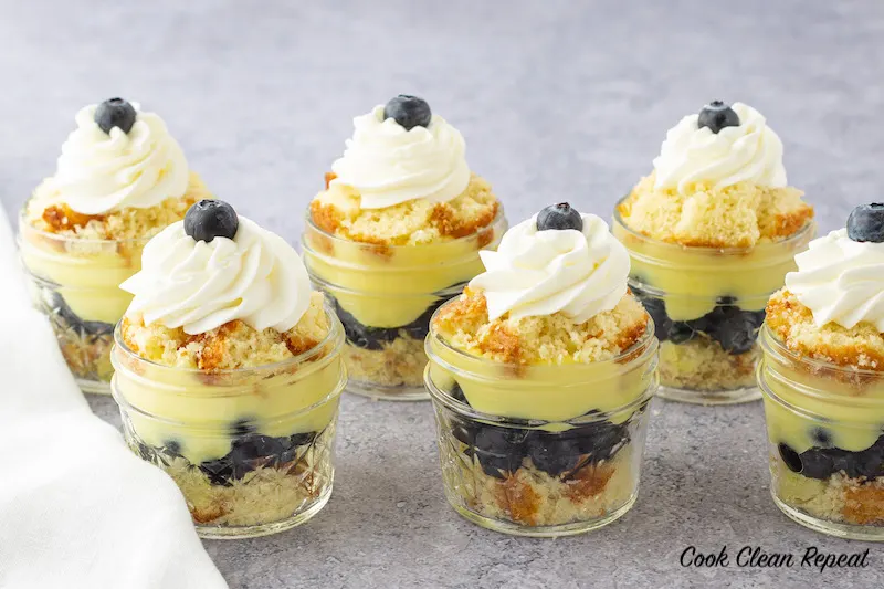 featured image showing finished blueberry lemon pudding cake in a jar