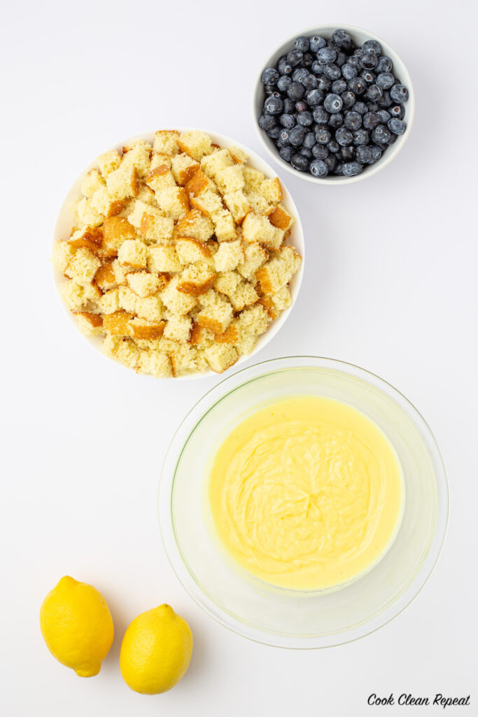 ingredients for blueberry lemon pudding cakes in a jar