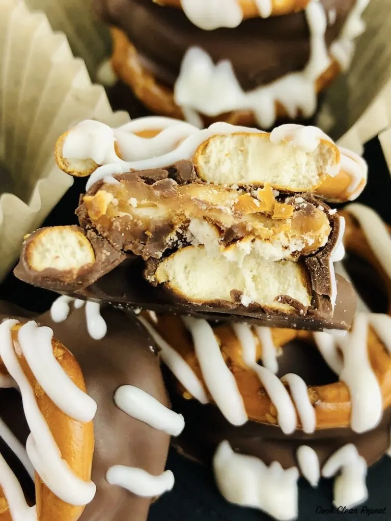 almond bark dipped pretzels ready to eat and share. 